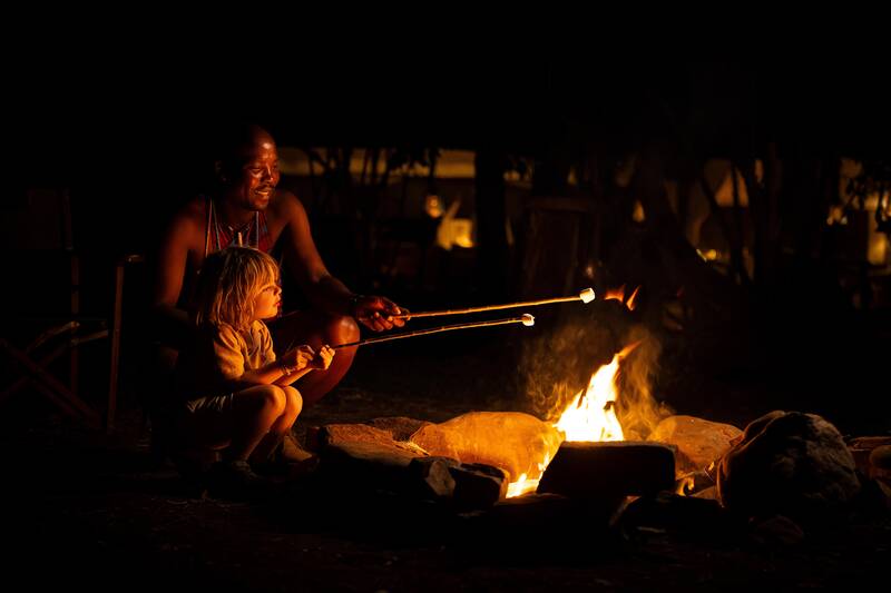 Toasting marshmallows at the campfire
