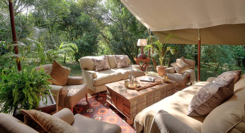 The mess verandah at Seringet, sofas and the Mara beyond
